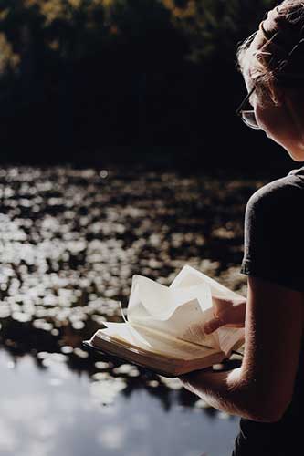 Reading by the Pond